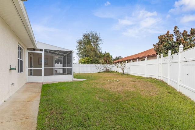 view of yard featuring a lanai