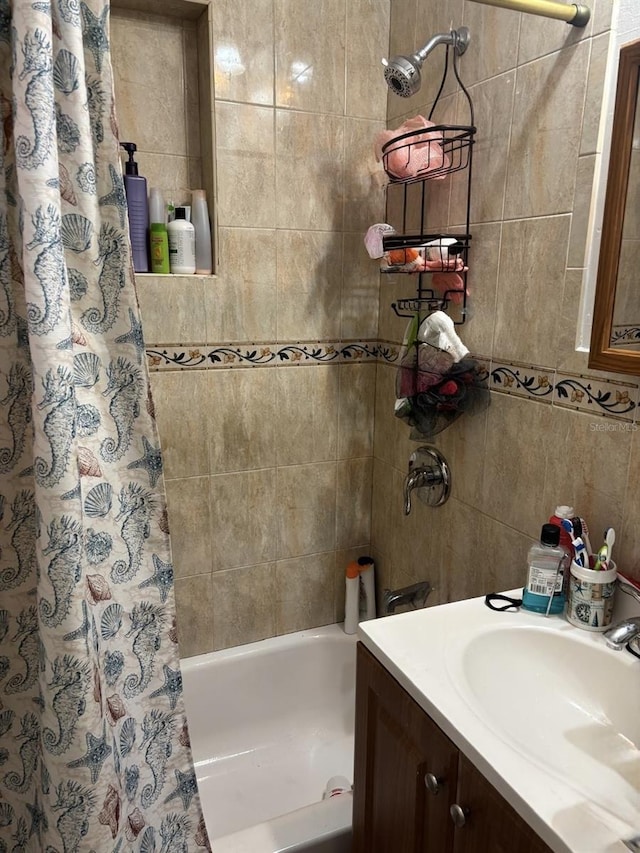 bathroom with vanity and shower / bath combo with shower curtain