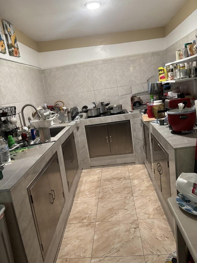 kitchen featuring dark brown cabinets