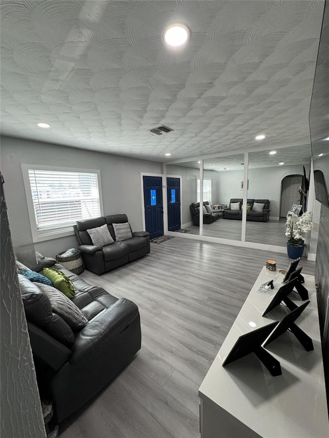 3565 NW 81st Ter, Miami, FL 33147 - living area featuring visible vents, wood finished floors, and recessed lighting