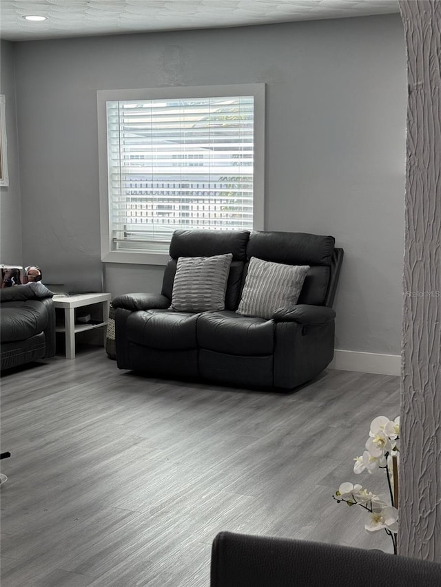 3565 NW 81st Ter, Miami, FL 33147 - living area with wood finished floors and baseboards