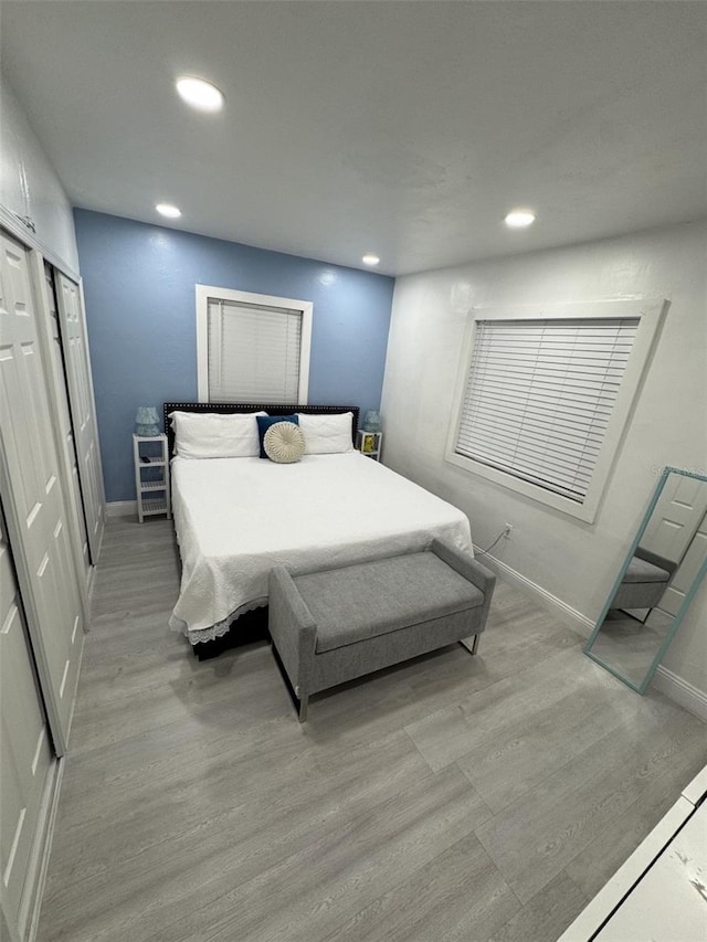 3565 NW 81st Ter, Miami, FL 33147 - bedroom featuring light wood-type flooring, baseboards, and recessed lighting