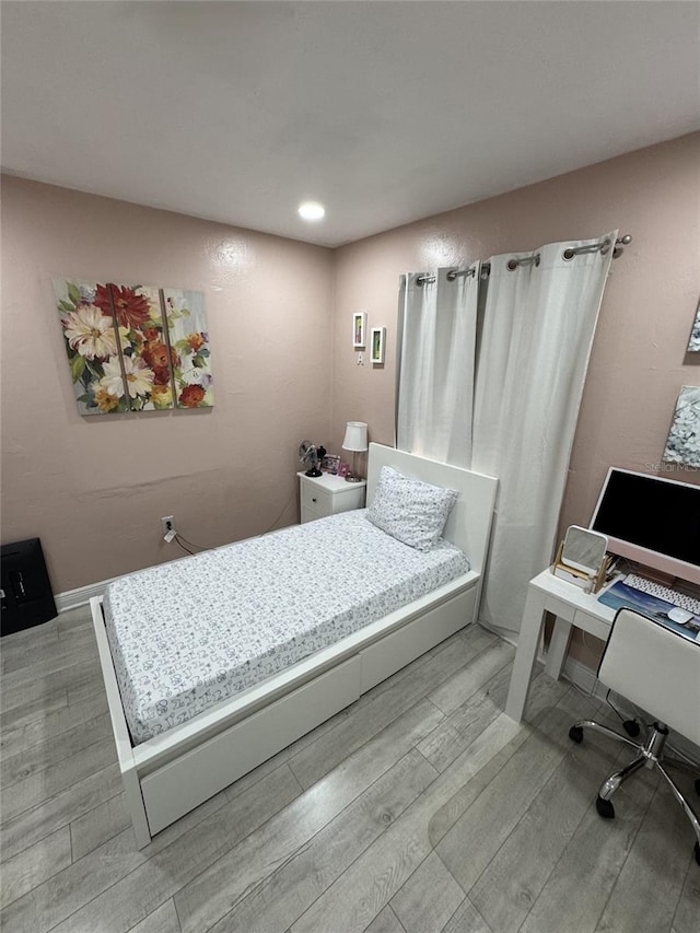 3565 NW 81st Ter, Miami, FL 33147 - bedroom featuring light wood-type flooring
