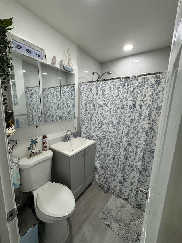 3565 NW 81st Ter, Miami, FL 33147 - bathroom with tasteful backsplash, toilet, a shower with curtain, wood finished floors, and vanity