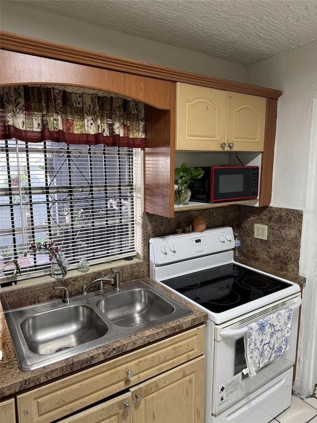 3565 NW 81st Ter, Miami, FL 33147 - kitchen featuring dark countertops, a sink, a textured ceiling, and white electric range