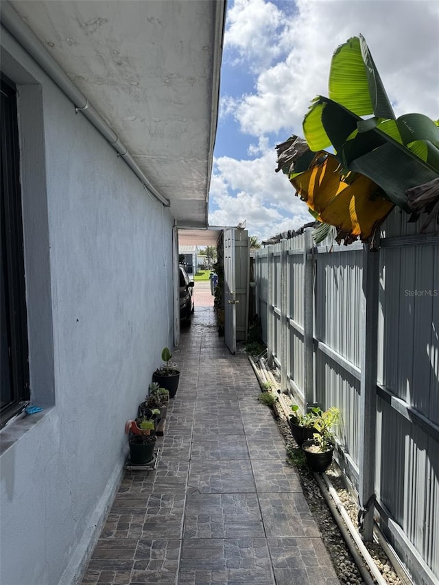 3565 NW 81st Ter, Miami, FL 33147 - view of side of property with a fenced backyard and stucco siding