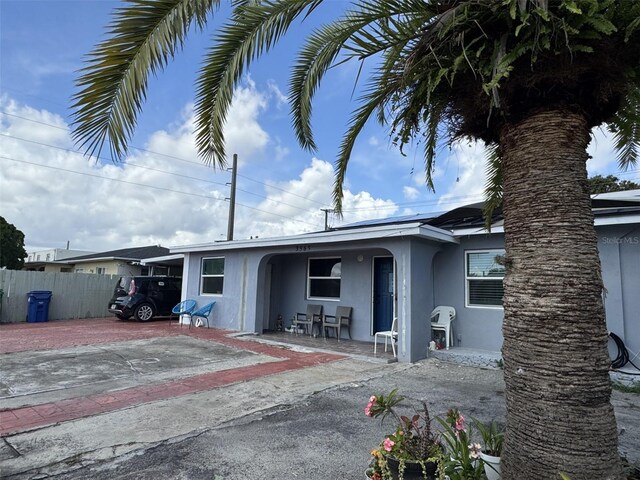 3565 NW 81st Ter, Miami, FL 33147 - exterior space featuring a patio area, fence, and stucco siding