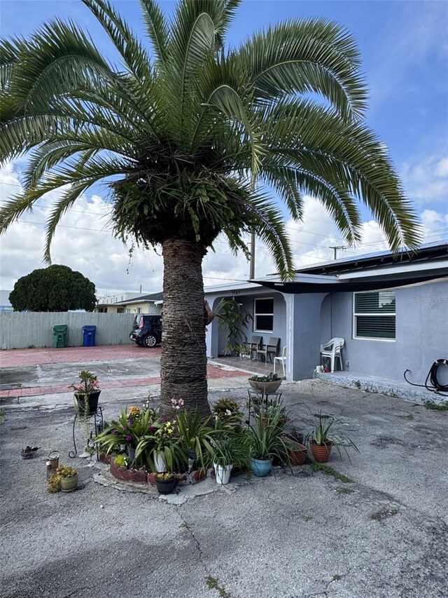 3565 NW 81st Ter, Miami, FL 33147 - exterior space featuring a patio, fence, and stucco siding
