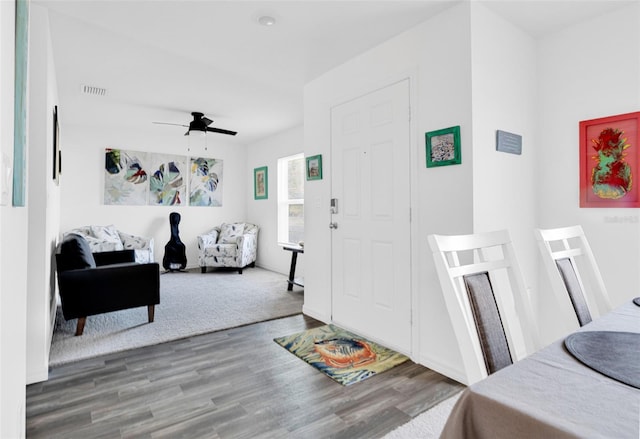 interior space with hardwood / wood-style flooring and ceiling fan