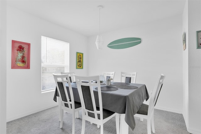 view of carpeted dining room