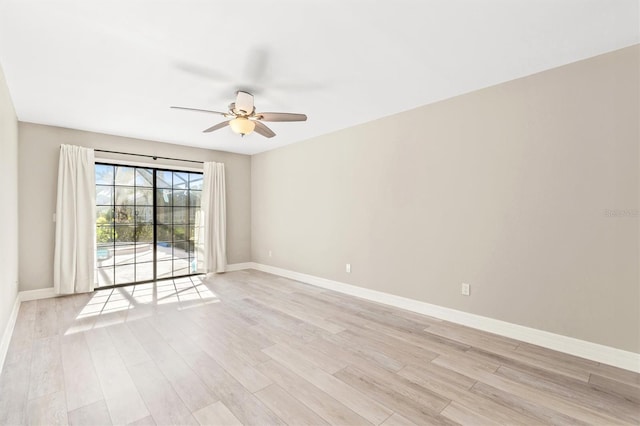 unfurnished room with light hardwood / wood-style flooring and ceiling fan