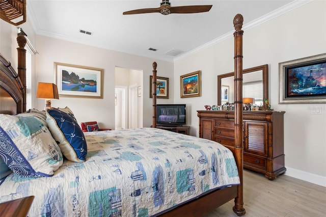 bedroom with ceiling fan, light wood-type flooring, and ornamental molding