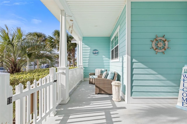 balcony featuring covered porch