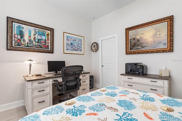 bedroom featuring light wood-type flooring