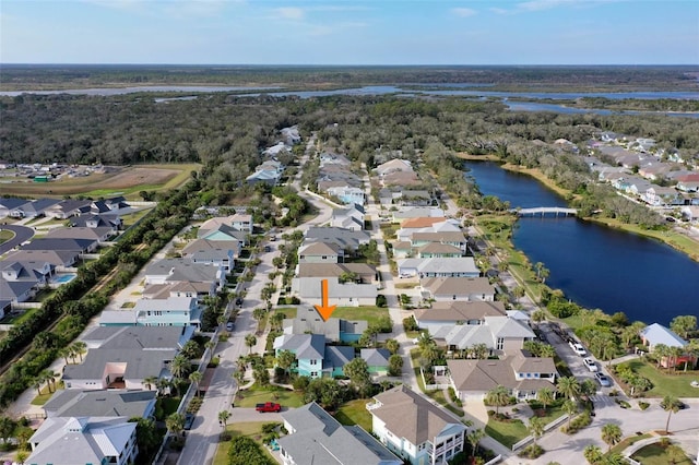 drone / aerial view featuring a water view