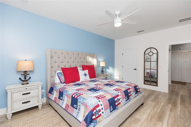 bedroom featuring ceiling fan and light wood-type flooring