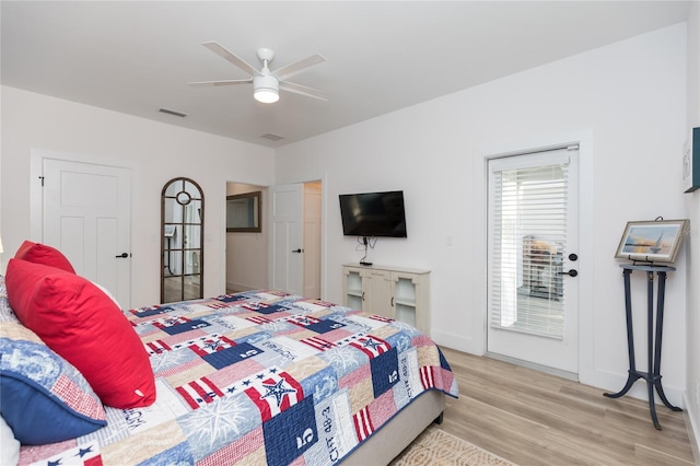 bedroom with ceiling fan, access to exterior, and light wood-type flooring