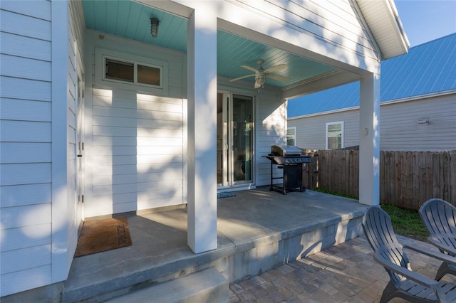 view of patio with grilling area and ceiling fan