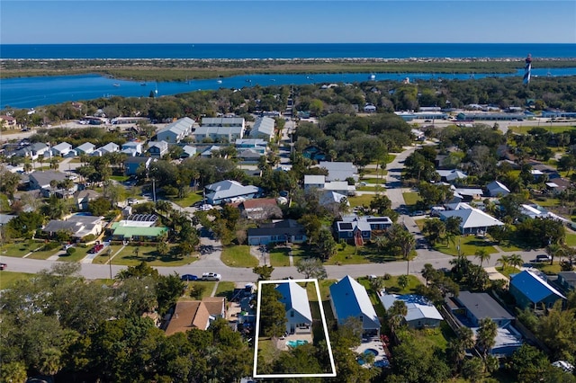 drone / aerial view with a water view