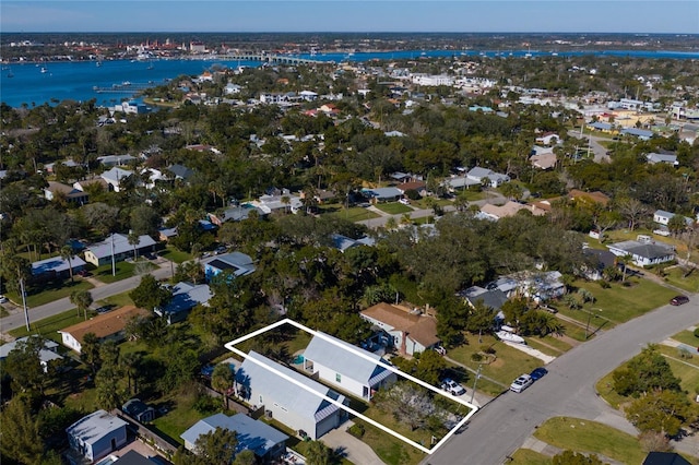 bird's eye view with a water view