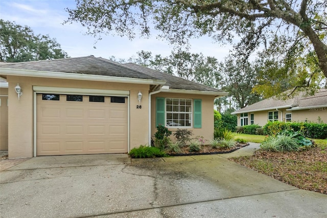 single story home with a garage