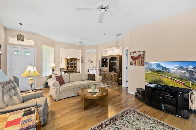 living room with light hardwood / wood-style floors