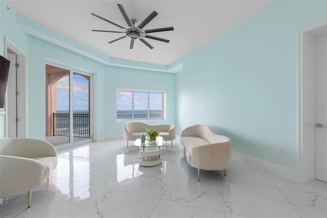 living area featuring ceiling fan