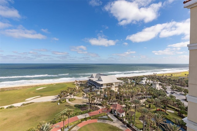 drone / aerial view featuring a view of the beach and a water view