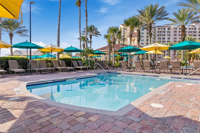 view of swimming pool with a patio area