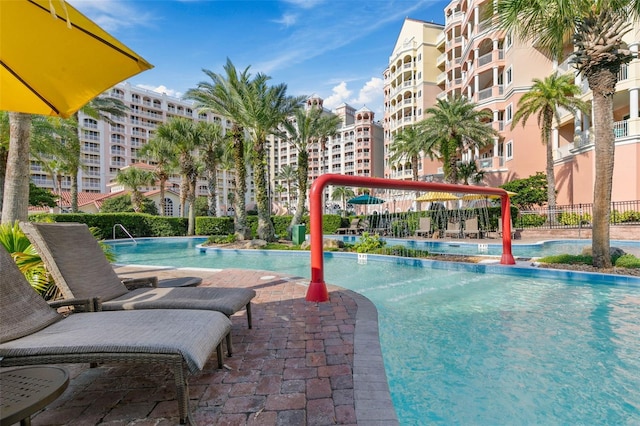 view of swimming pool featuring a patio