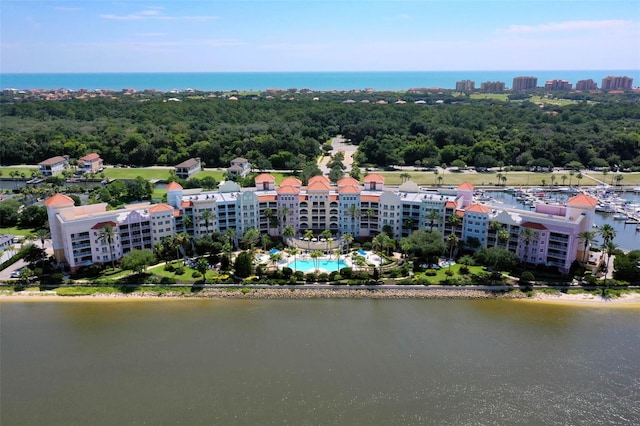 birds eye view of property featuring a water view