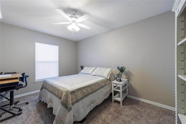 bedroom featuring carpet flooring, ceiling fan, and a textured ceiling