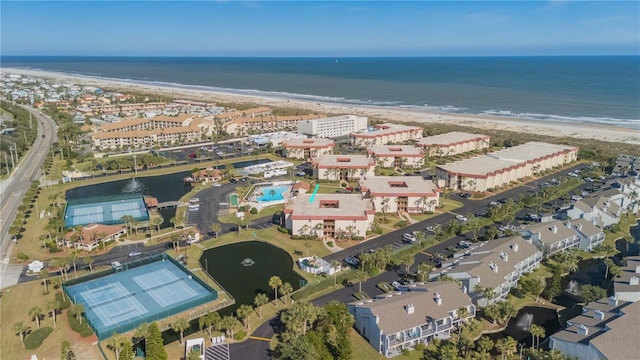 bird's eye view with a view of the beach and a water view