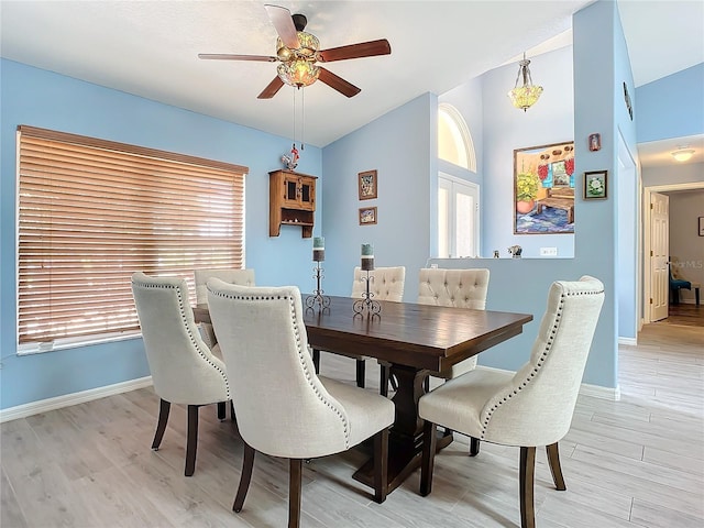 dining room featuring ceiling fan and light hardwood / wood-style flooring