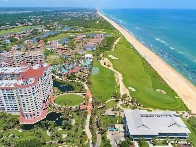 drone / aerial view with a water view and a beach view