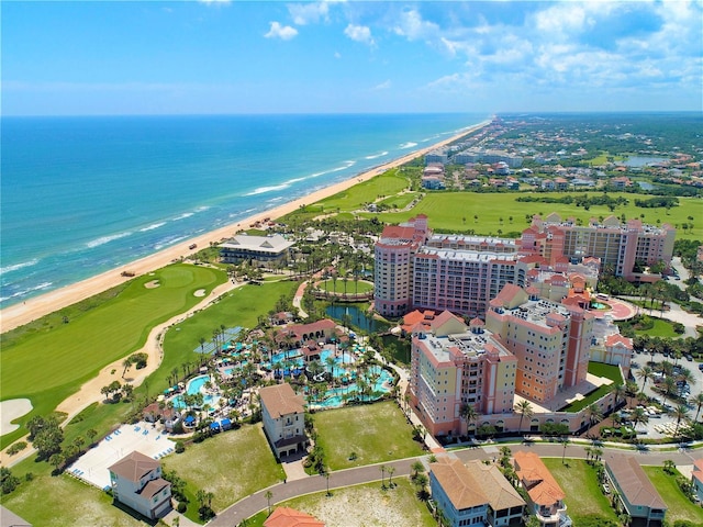 drone / aerial view with a water view and a view of the beach