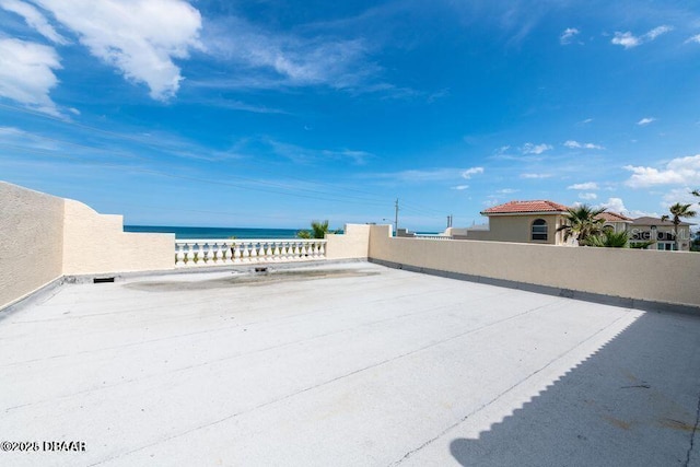 view of patio featuring a water view