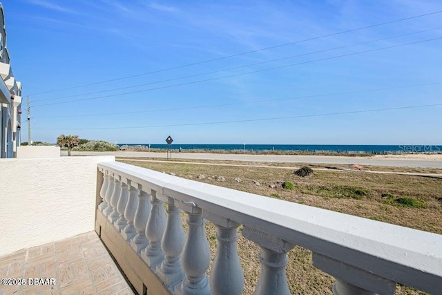 property view of water featuring a beach view