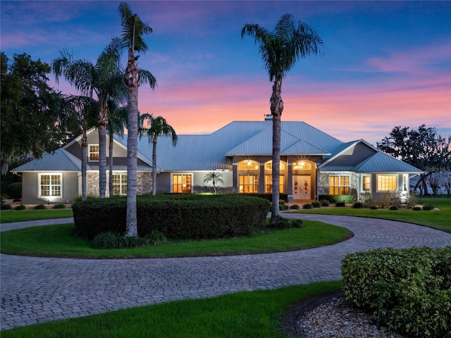 view of front of house with a lawn