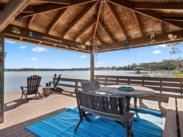 exterior space featuring a gazebo and a water view