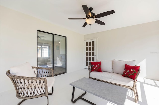 living room featuring ceiling fan