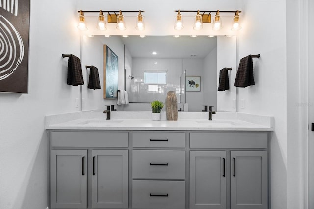 bathroom featuring vanity and walk in shower