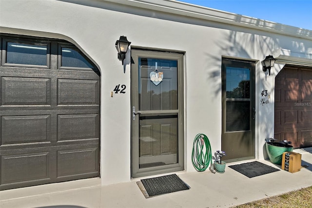 entrance to property with a garage