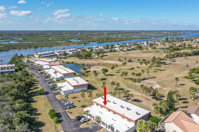 birds eye view of property featuring a water view