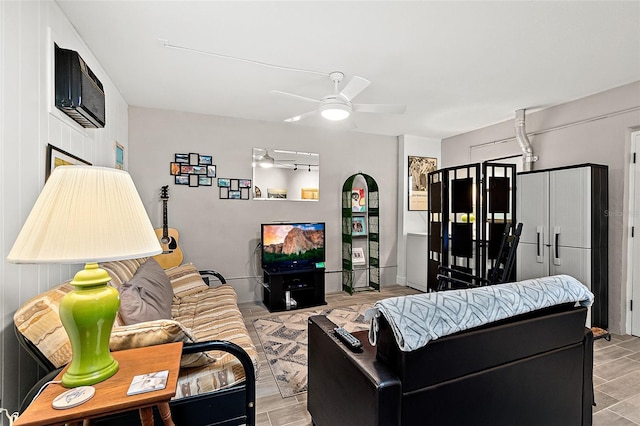 living room with ceiling fan