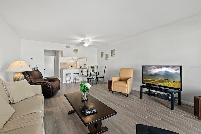 living room with ceiling fan