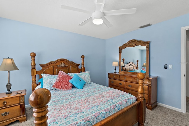 bedroom featuring ceiling fan and light colored carpet