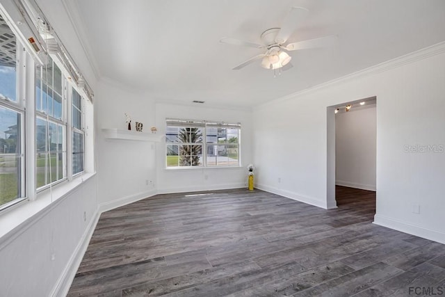 spare room with dark wood-type flooring, ceiling fan, and ornamental molding