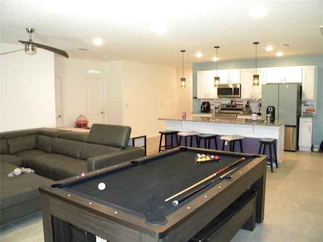 recreation room with ceiling fan, light tile patterned flooring, and billiards