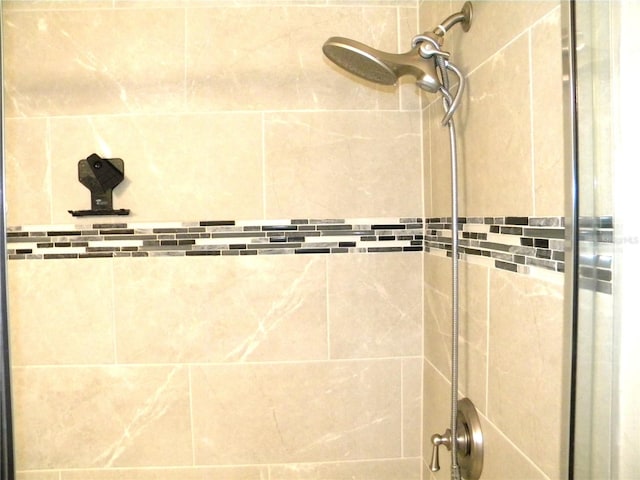 details featuring a tile shower